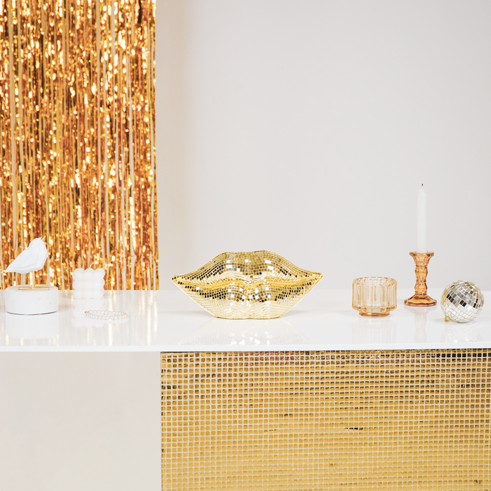 Disco lips. Discobal in de vorm van lippen goud