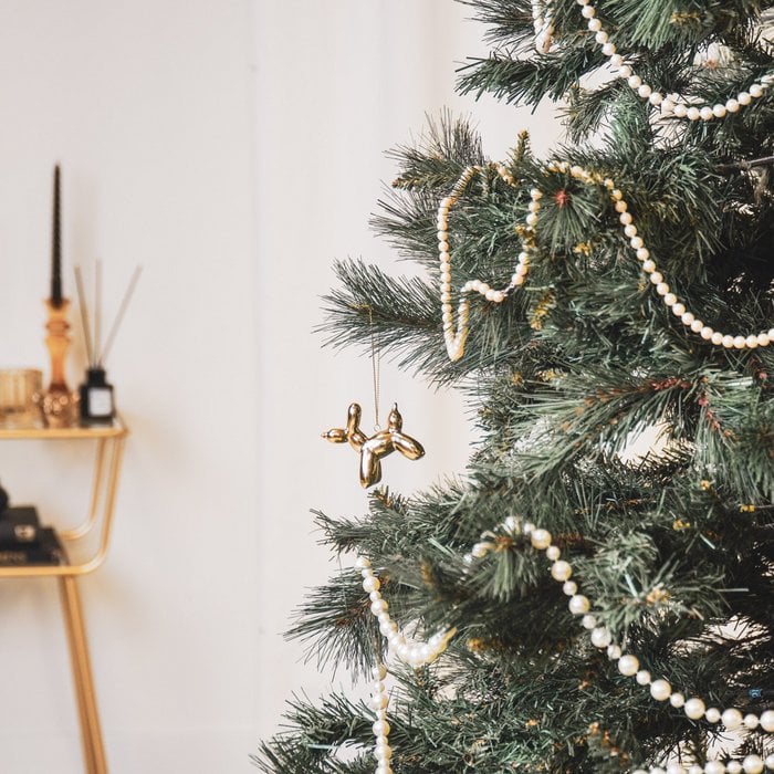 Balloondog kersthanger goud. Ornament voor in de kerstboom ballonhondje