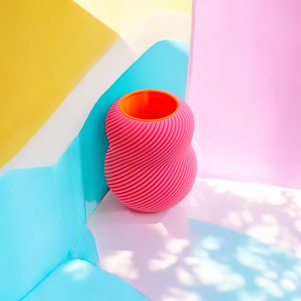 Vaas Bloom Flamingo. Neon roze met neon oranje waterdicht cilinder. 3D-geprint