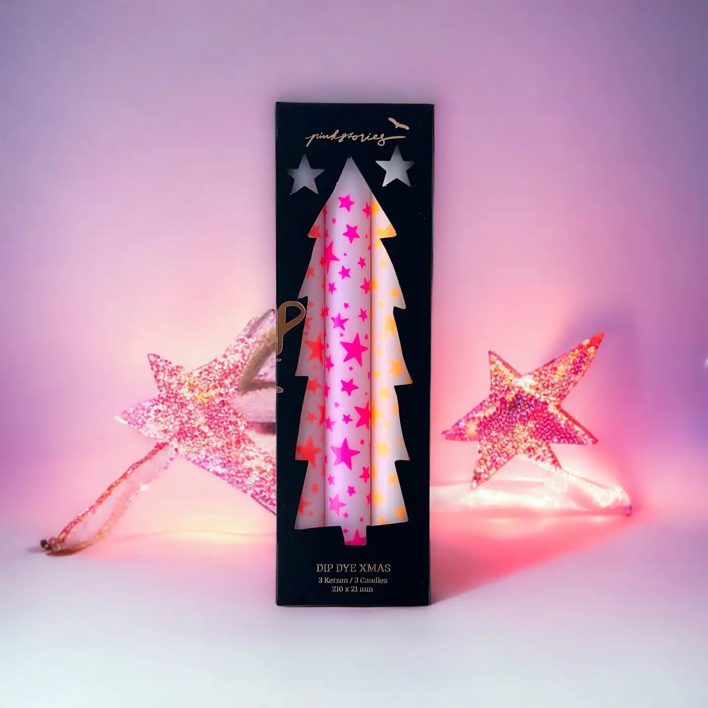 Kerstkaarsen met sterren. Set van 3. Roze, oranje en geel