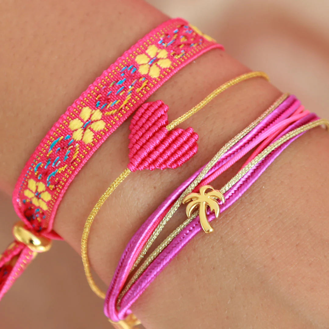 Love Ibiza kleurrijke armbanden. Roze met goud