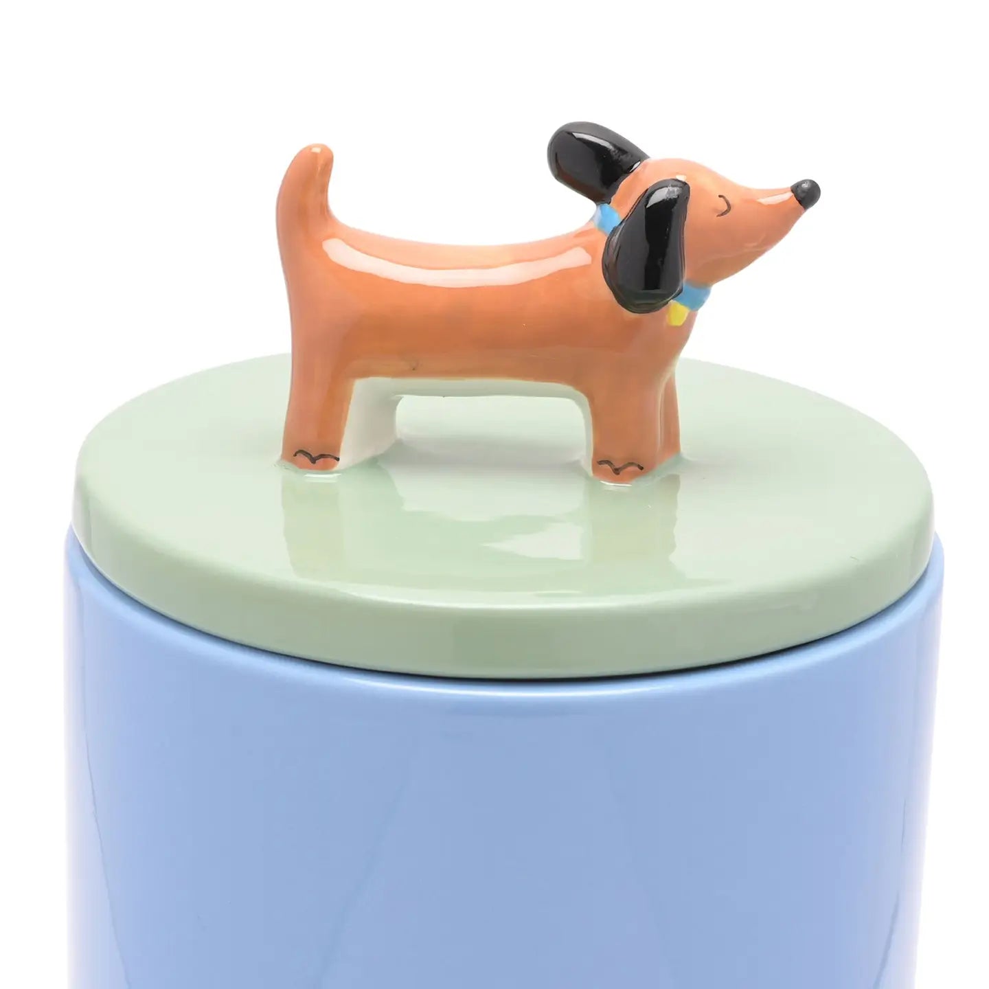 Dog treat jar. Pot voor hondenkoekjes. Blauw met groene deksel en teckel erop.