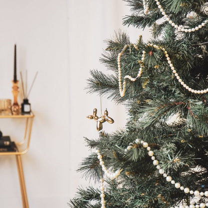 Balloondog kersthanger goud. Ornament voor in de kerstboom ballonhondje 