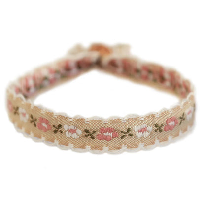 Love Ibiza geweven armband. Beige bloemen 