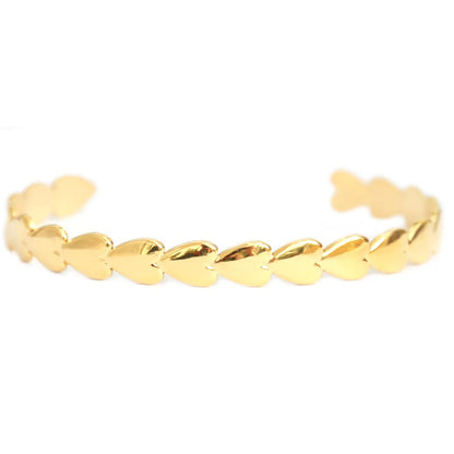 Love Ibiza gouden bangle met hartjes. Roestvrij staal. 