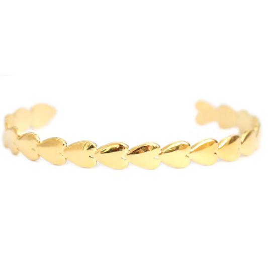 Love Ibiza gouden bangle met hartjes. Roestvrij staal. 