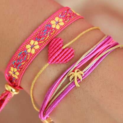 Love Ibiza kleurrijke armbanden. Roze met goud